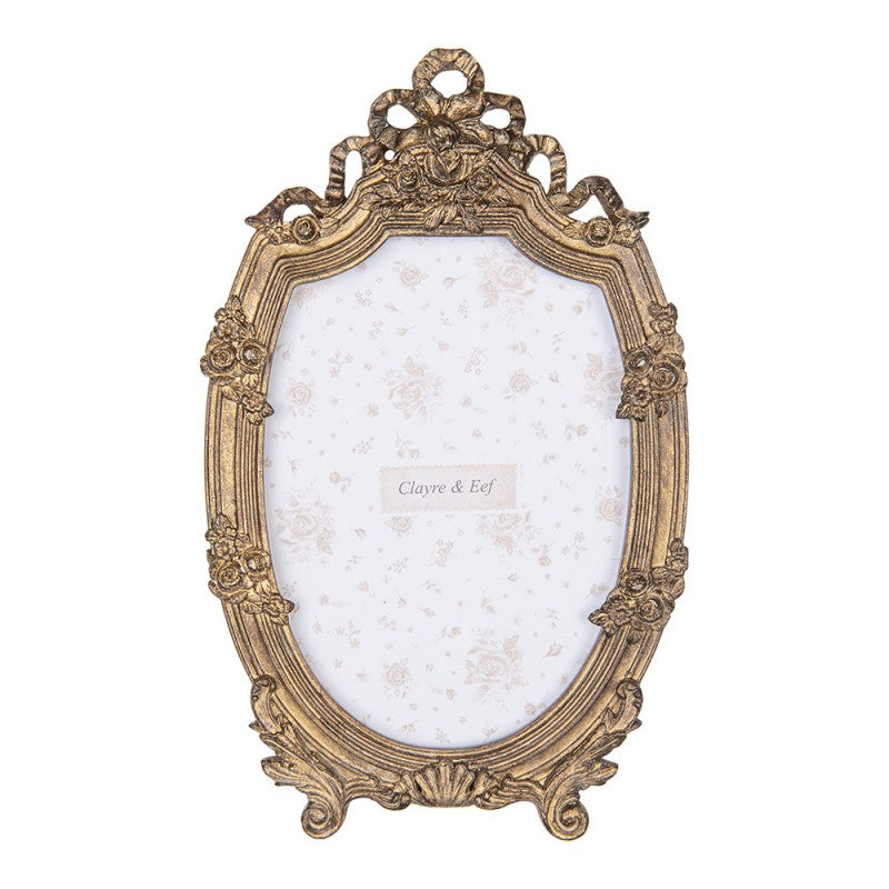 Cornice dorata in stile vittoriano con decori