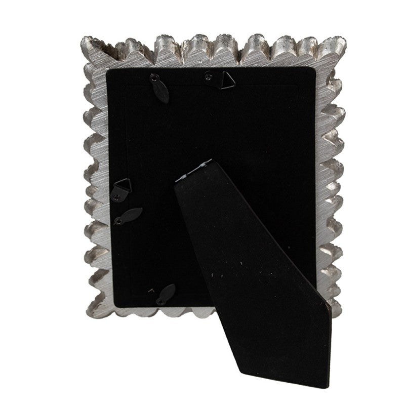 Cornice argento con piume