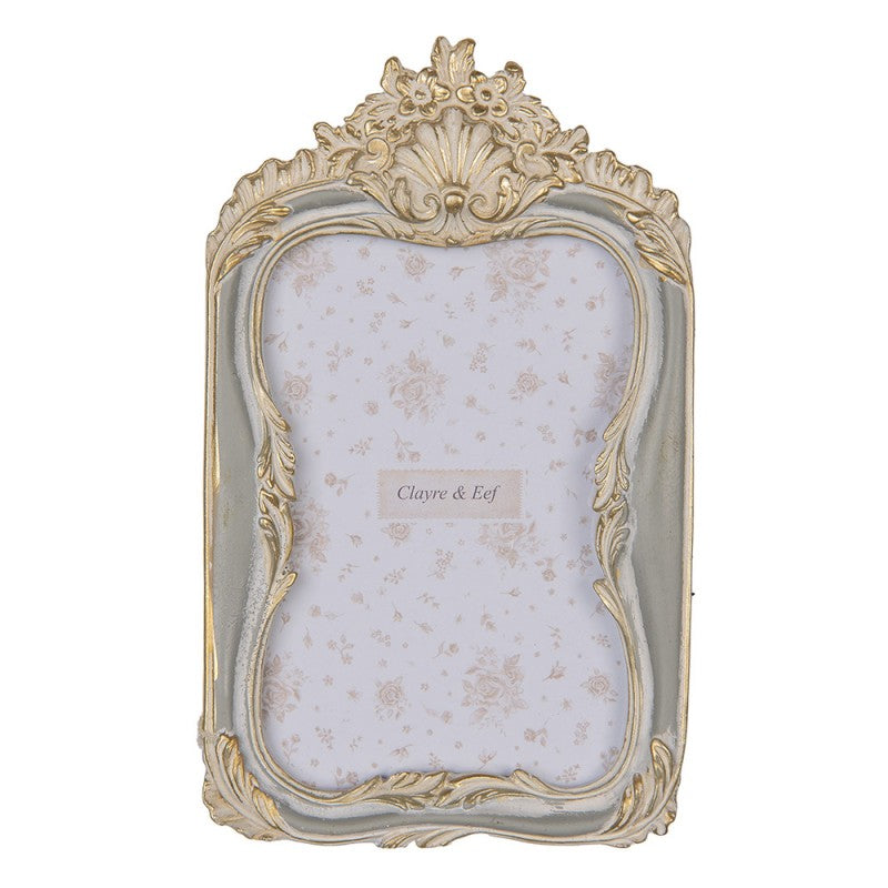 Cornice con decorazione a conchiglia grigia ed oro