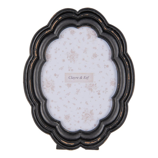 Cornice nera e marrone anticata