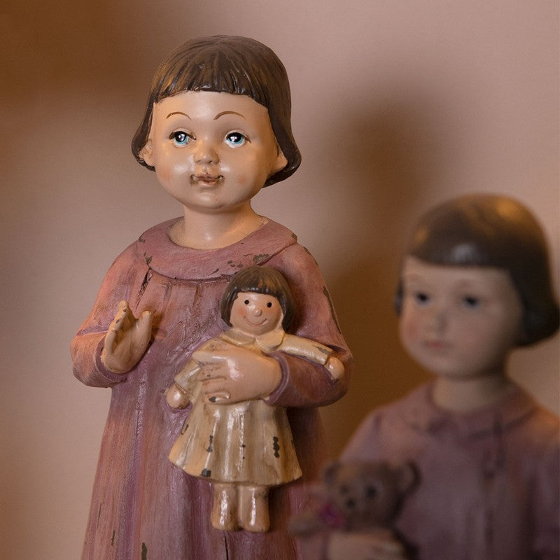 Statuetta bambina con orsacchiotto grande