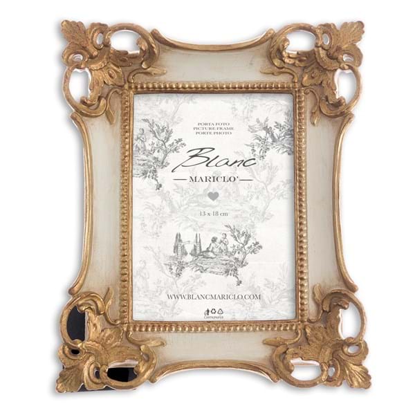 Cornice bianca con angoli oro