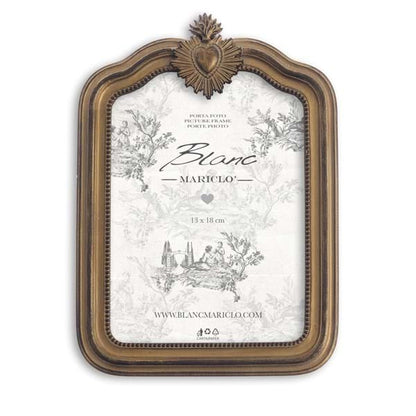 Cornice dorata con cuore sacro